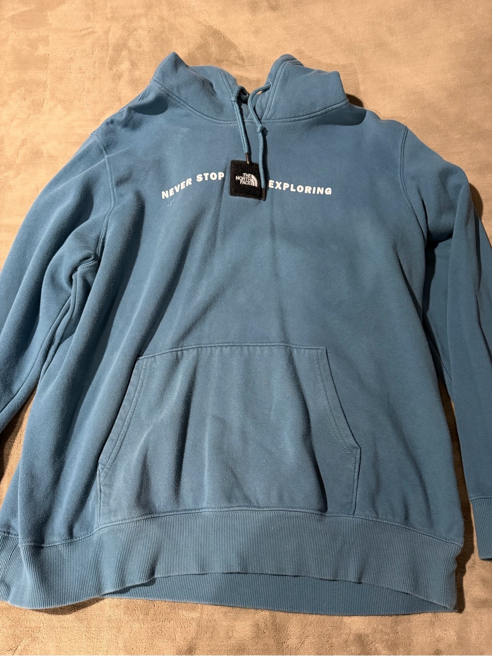 The North Face Men’s Teal Pullover Hoodie with 'Never Stop Exploring'